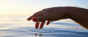 hand and water
